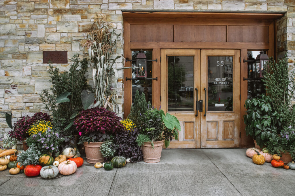 Wooden doors decorated with fall decor. 